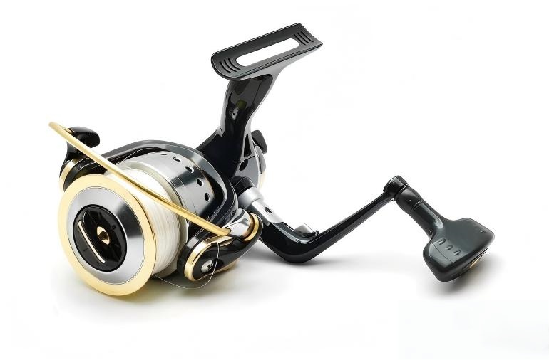 High-quality spinning reel with white fishing line, featuring precision ball bearings for smooth performance.jpg